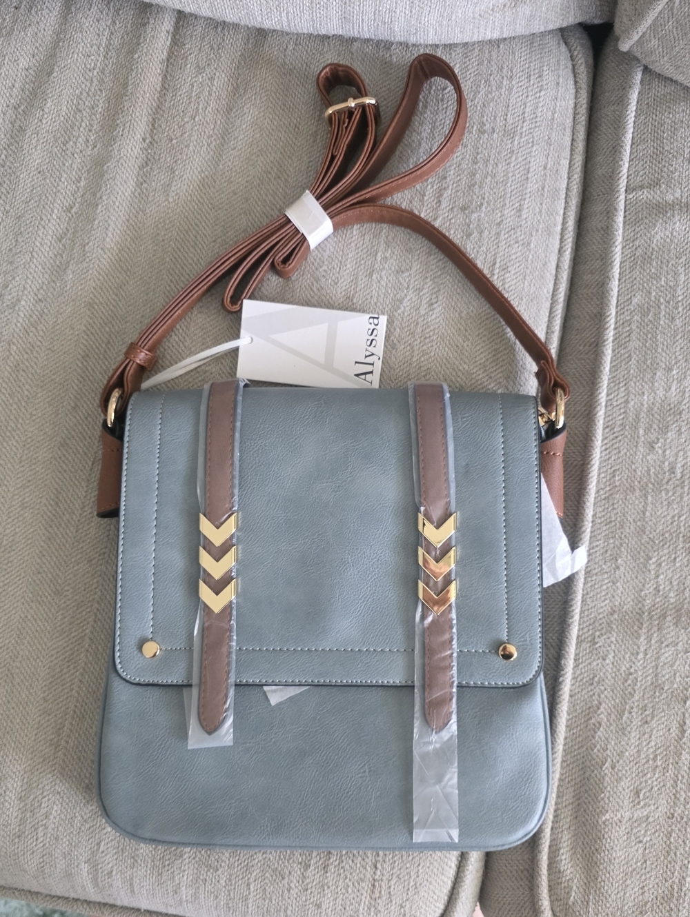 Blue Crossbody Bag with Brown Straps And Gold Accents